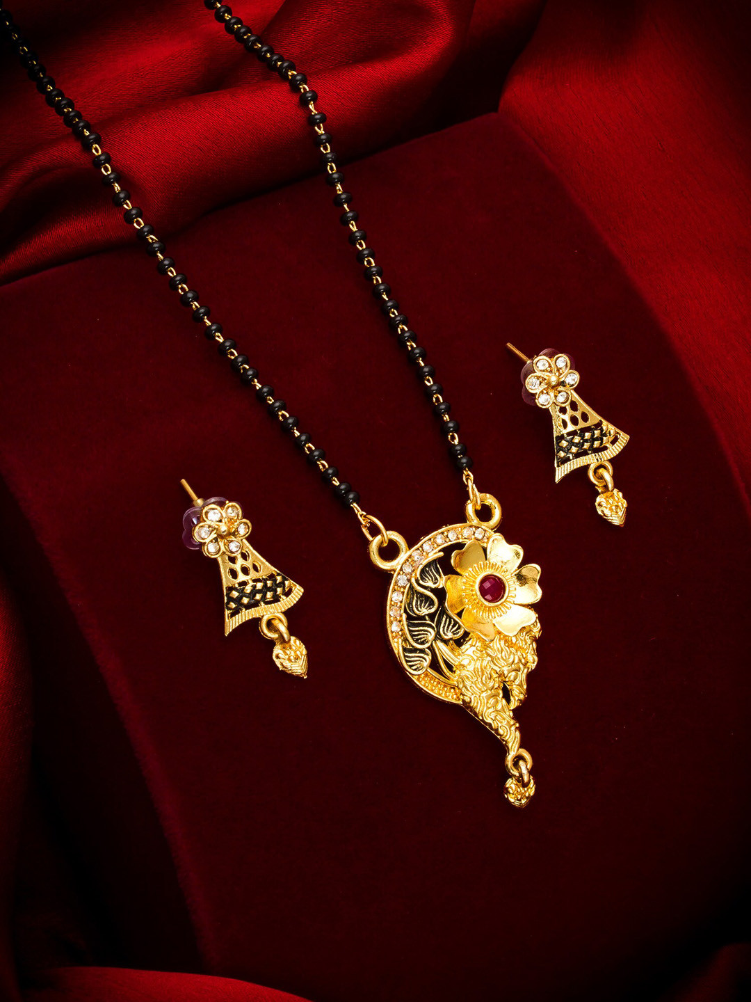 

aadita Gold Toned AD and Pearl Mangalsutra with Earrings
