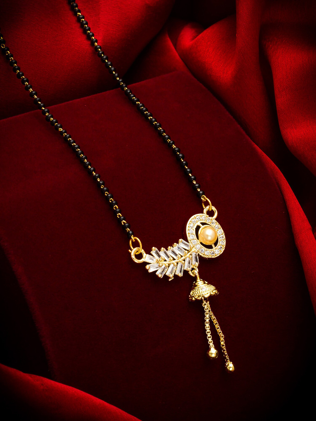 

aadita Gold-Plated Black & White AD-Studded & Beaded Mangalsutra