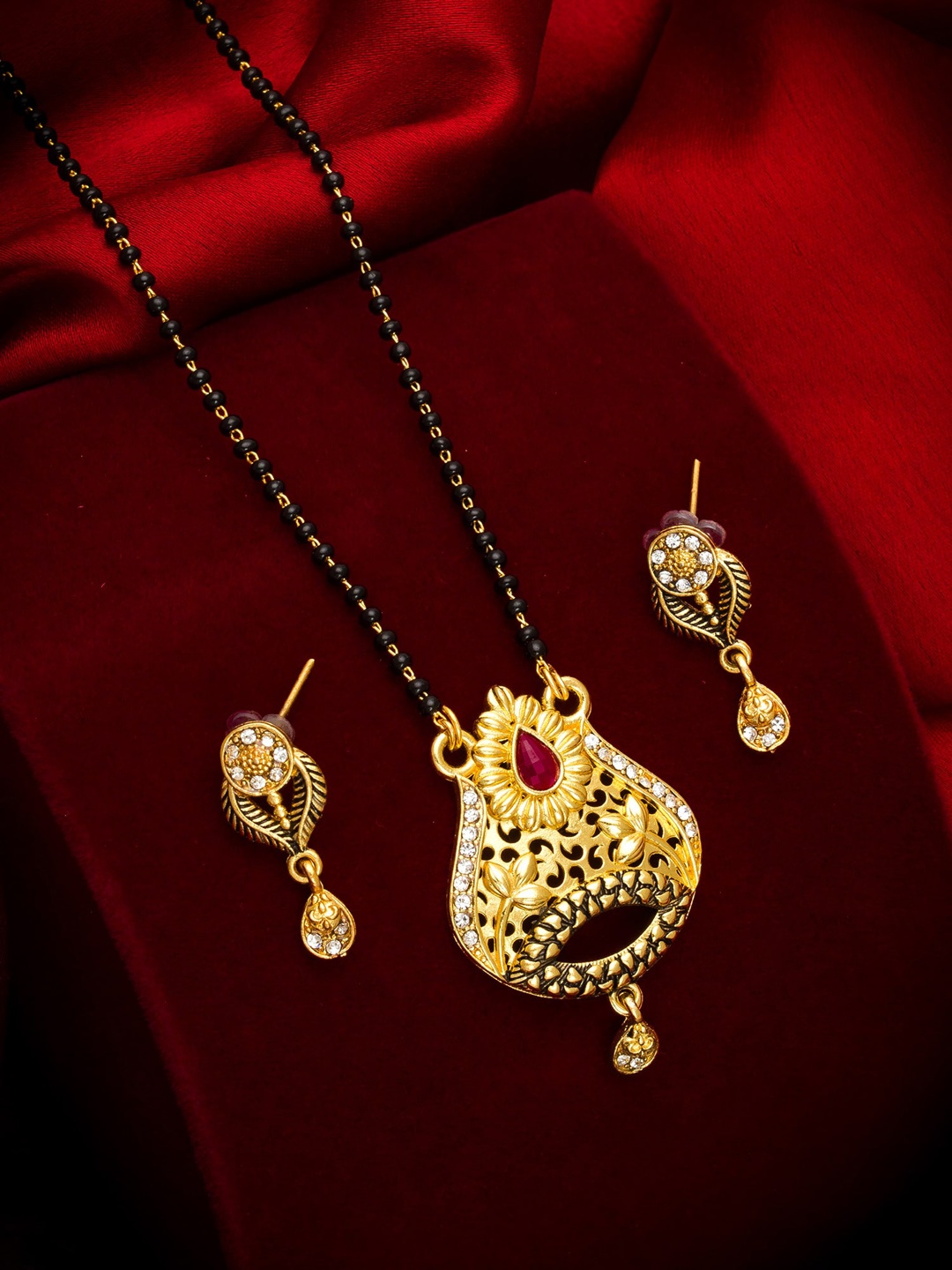 

aadita Gold Toned & Black Alloy Gold Plated Beaded Mangalsutra Set