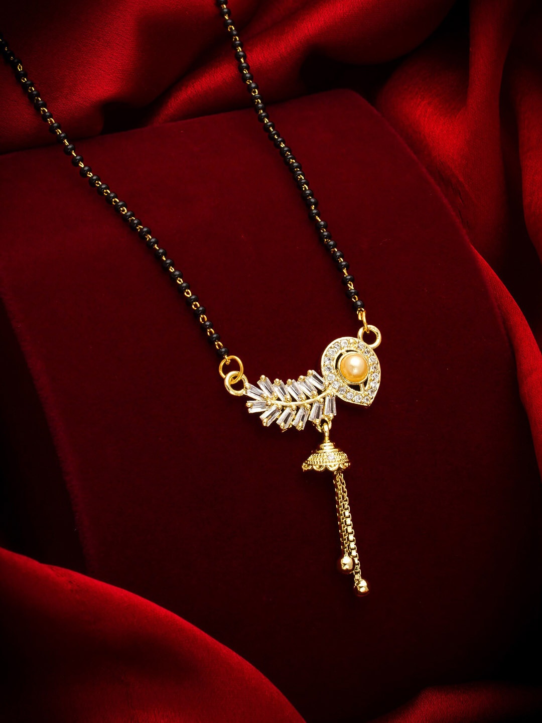 aadita Gold-Toned White Stone Studded & Black Beaded Mangalsutra