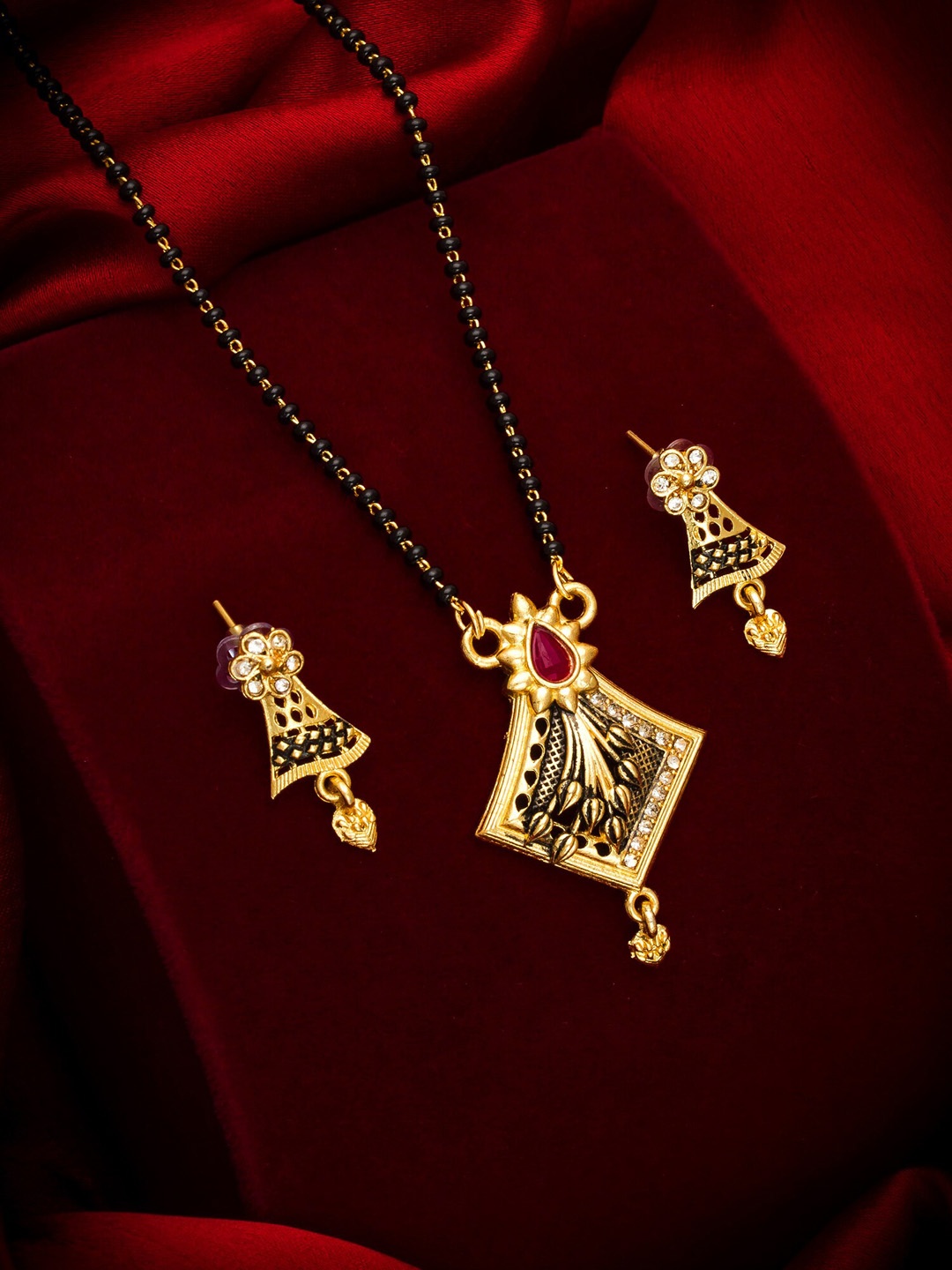 

aadita Gold Toned & Black Alloy Gold Plated Beaded Mangalsutra Set