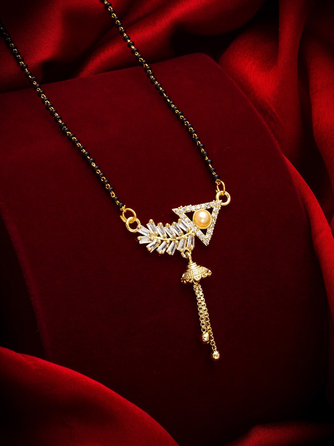 

aadita Gold-Plated Black & White AD-Studded & Beaded Mangalsutra