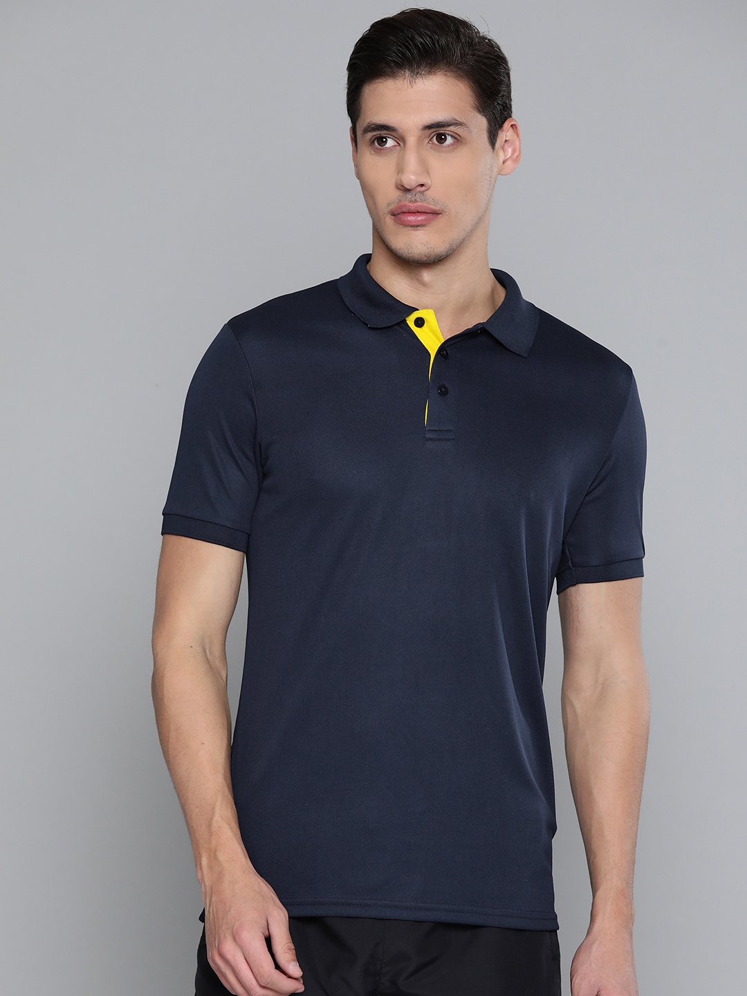 

Alcis Men Navy Blue Solid Polo Collar Slim Fit T-shirt