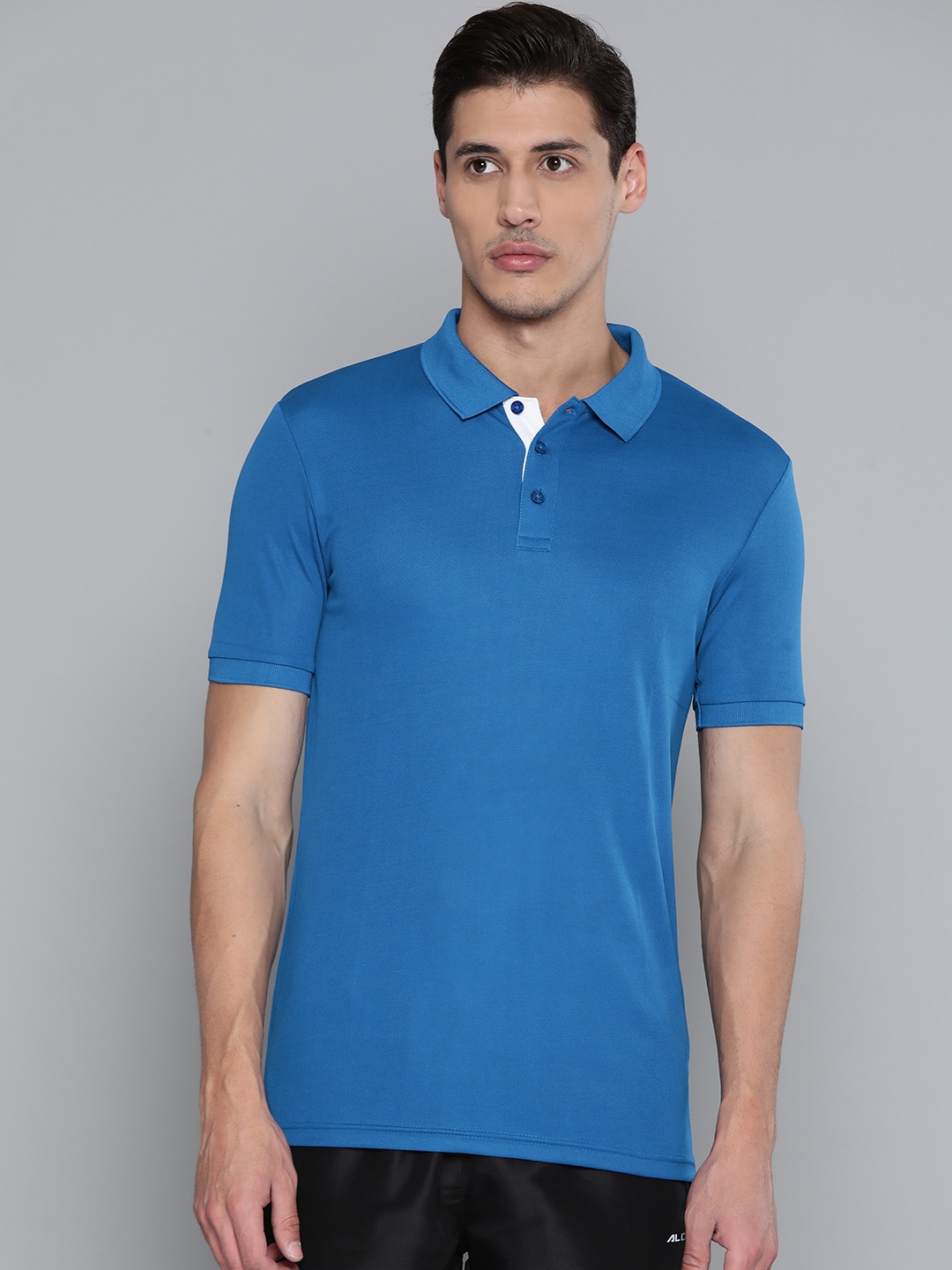 

Alcis Men Blue Solid Polo Collar Slim Fit T-shirt