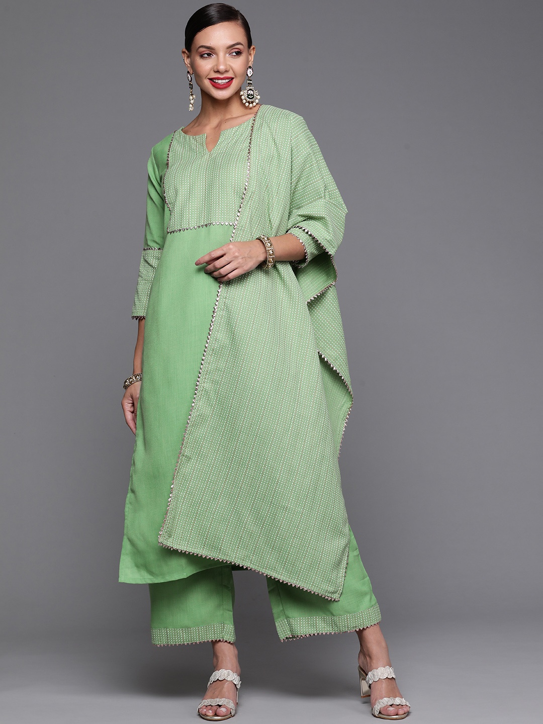 

Indo Era Women Sea Green Yoke Design Gotta Patti Kurta with Palazzos & Dupatta
