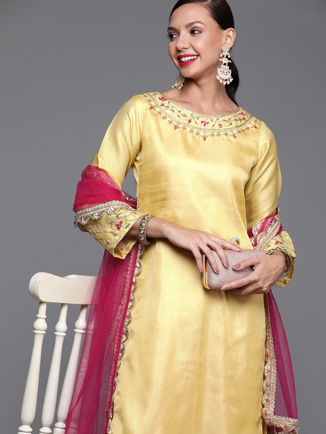 

Indo Era Women Yellow Floral Sequinned Liva Kurta with Trousers & Dupatta
