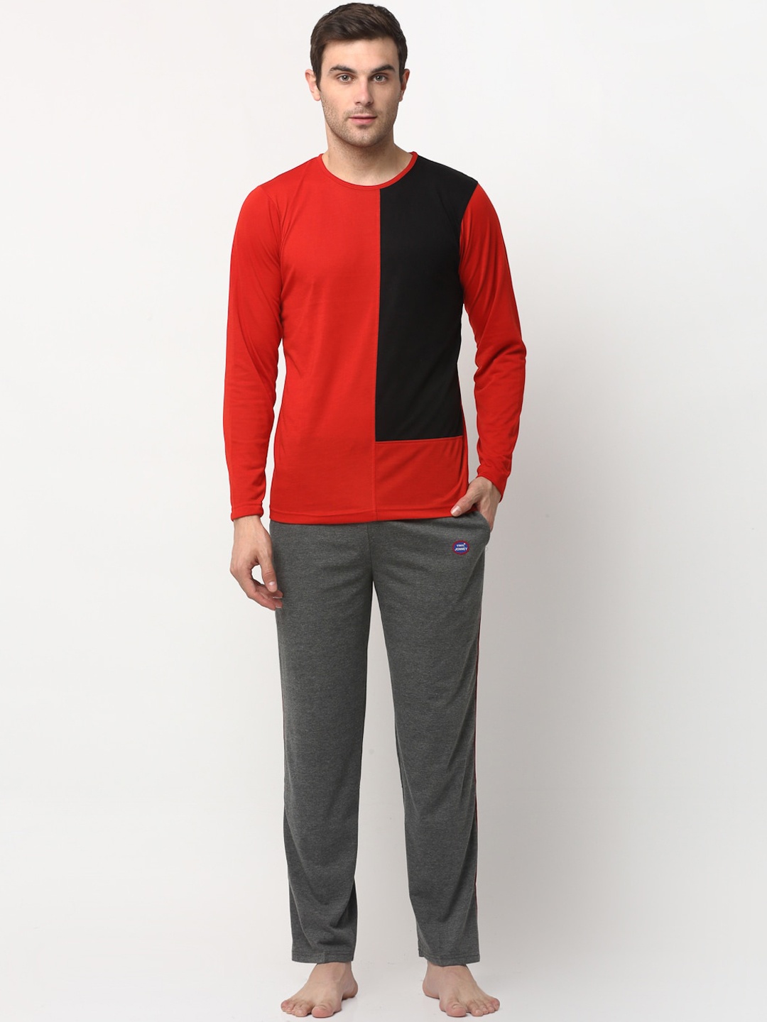 

VIMAL JONNEY Men Red & Black Colourblocked Cotton Blend Tracksuit