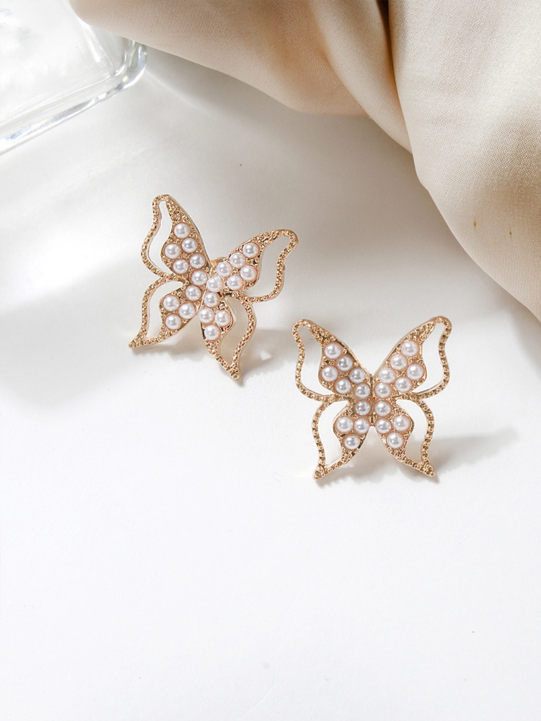 

ToniQ Gold-Plated & White Cubic Zirconia Contemporary Studs Earrings