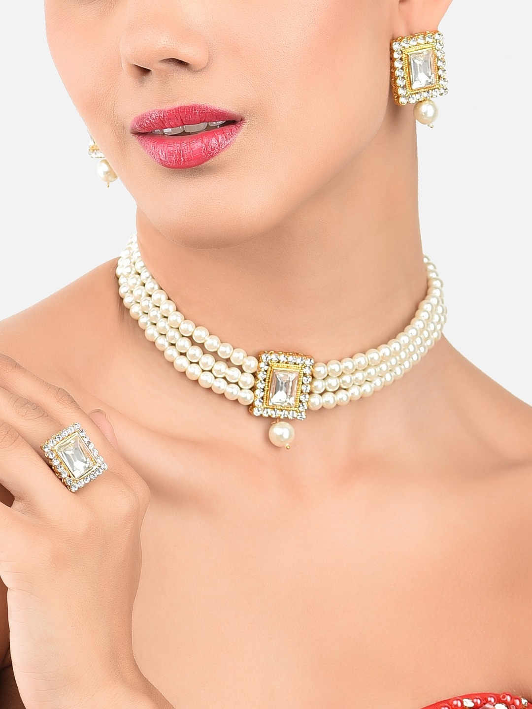 

Zaveri Pearls Gold-Plated White Stone-Studded & Pearl Beaded Jewellery Set