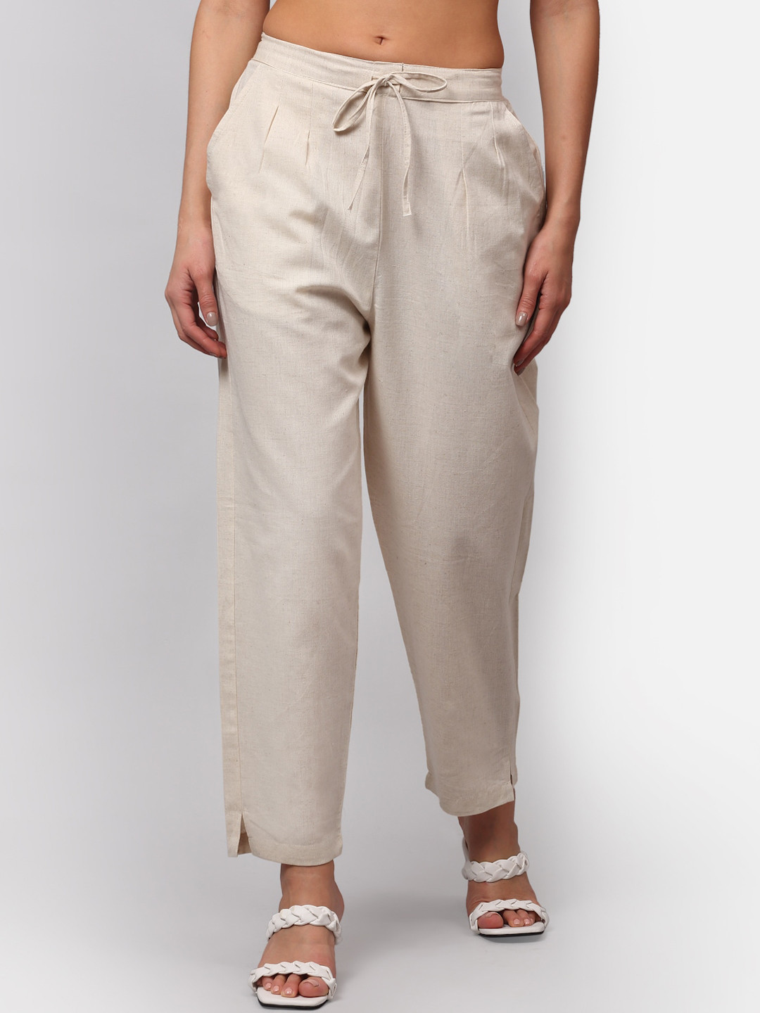 

NEUDIS Women Beige Tapered Fit Pleated Cigerette Trousers