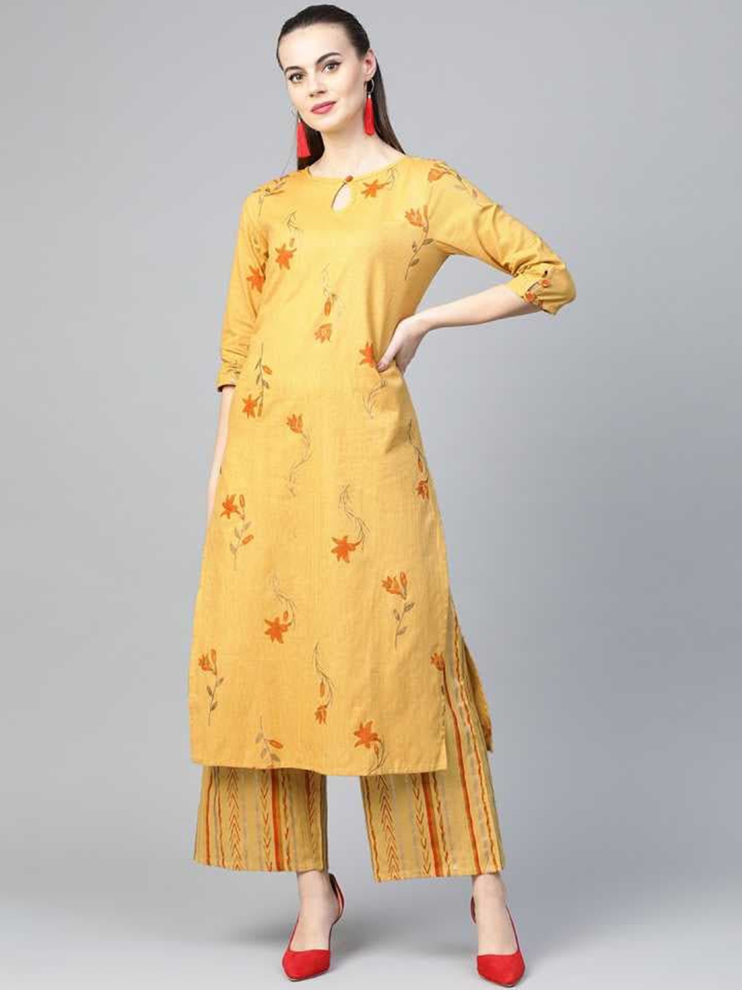 

Yuris Women Mustard Yellow Floral Printed Pure Cotton Kurta with Palazzos