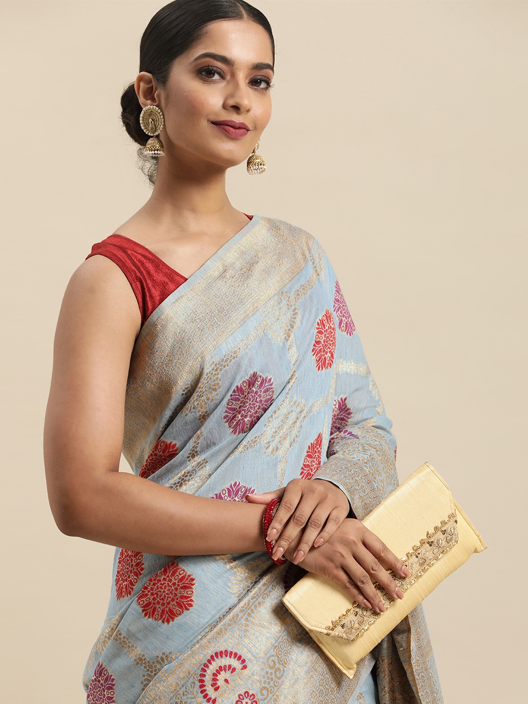 

Anouk Blue & Gold-Toned Ethnic Motifs Zari Silk Blend Banarasi Saree