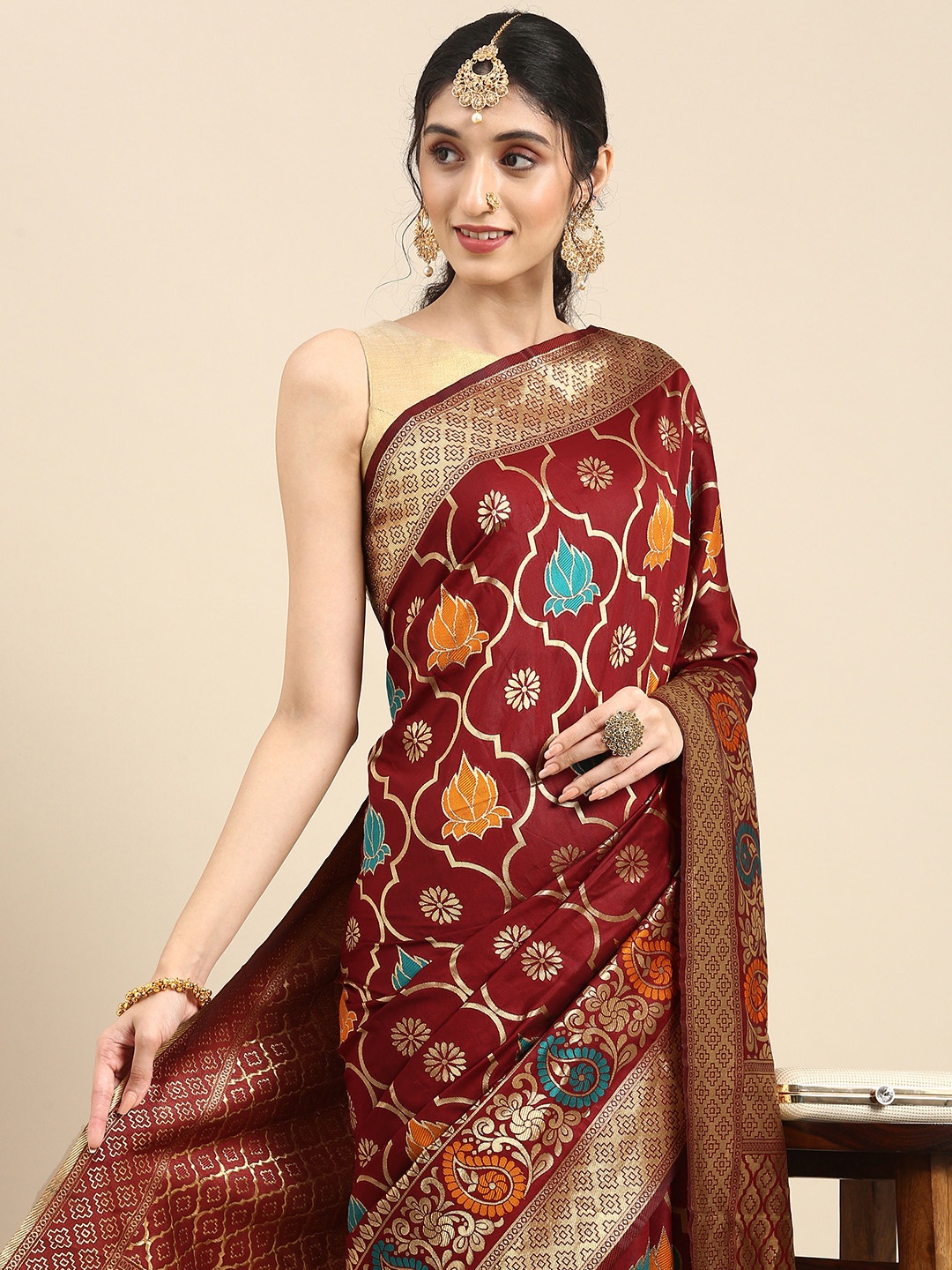 

Anouk Maroon Woven Design Zari Silk Blend Heavy Work Banarasi Saree