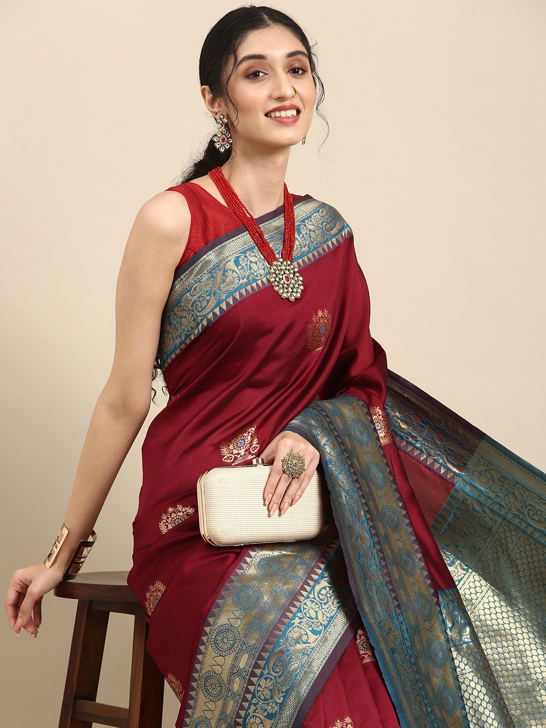 

Anouk Burgundy Woven Design Zari Silk Blend Heavy Work Banarasi Saree