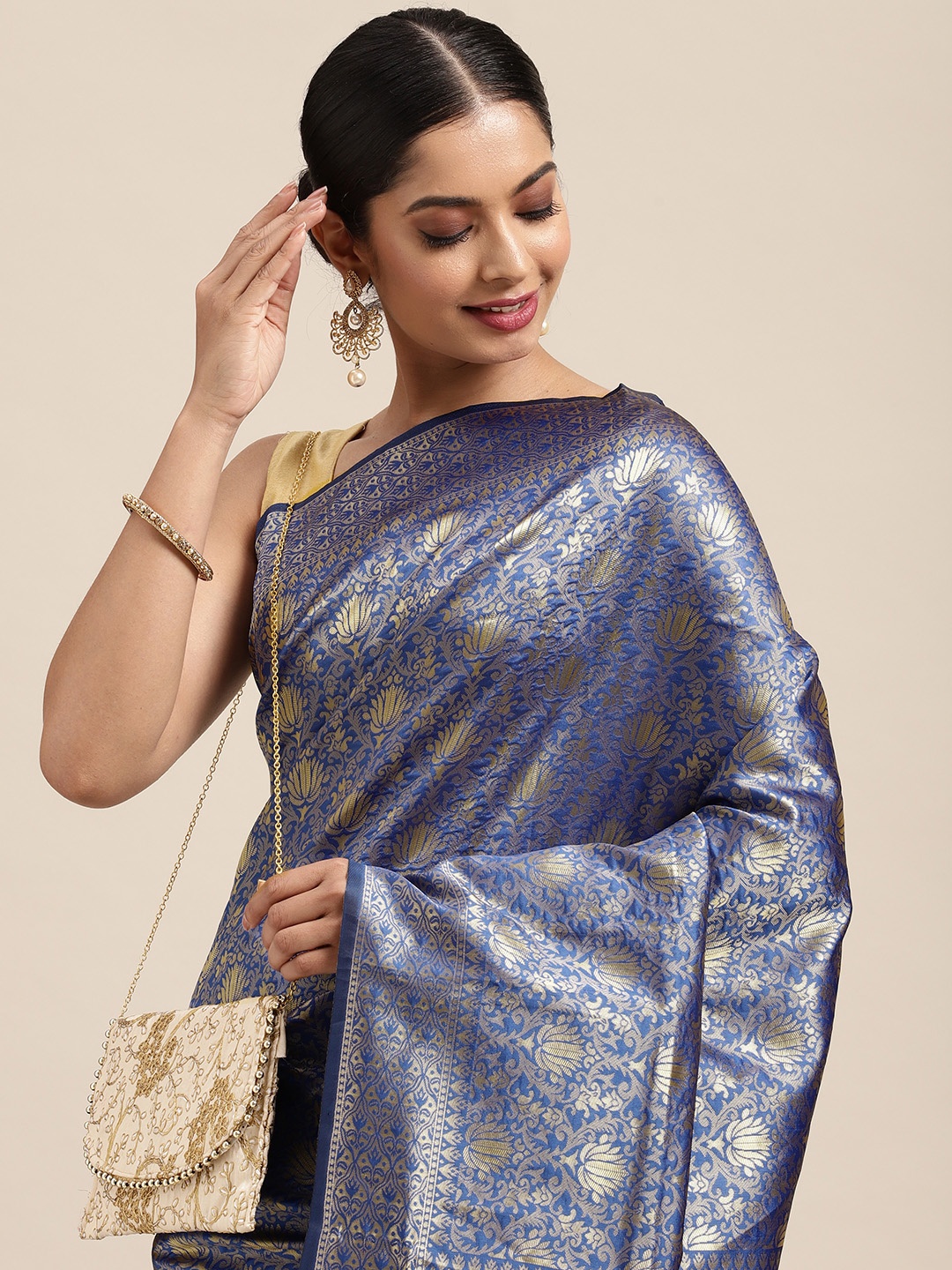 

Anouk Blue & Gold-Toned Ethnic Motifs Zari Pure Silk Heavy Work Banarasi saree