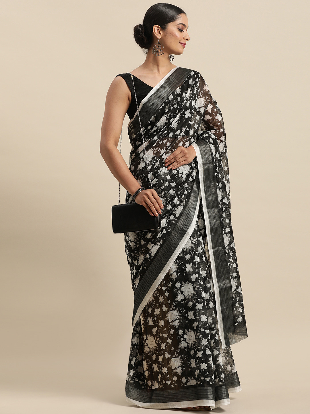 

Anouk Black & White Floral Linen Blend Jamdani Saree