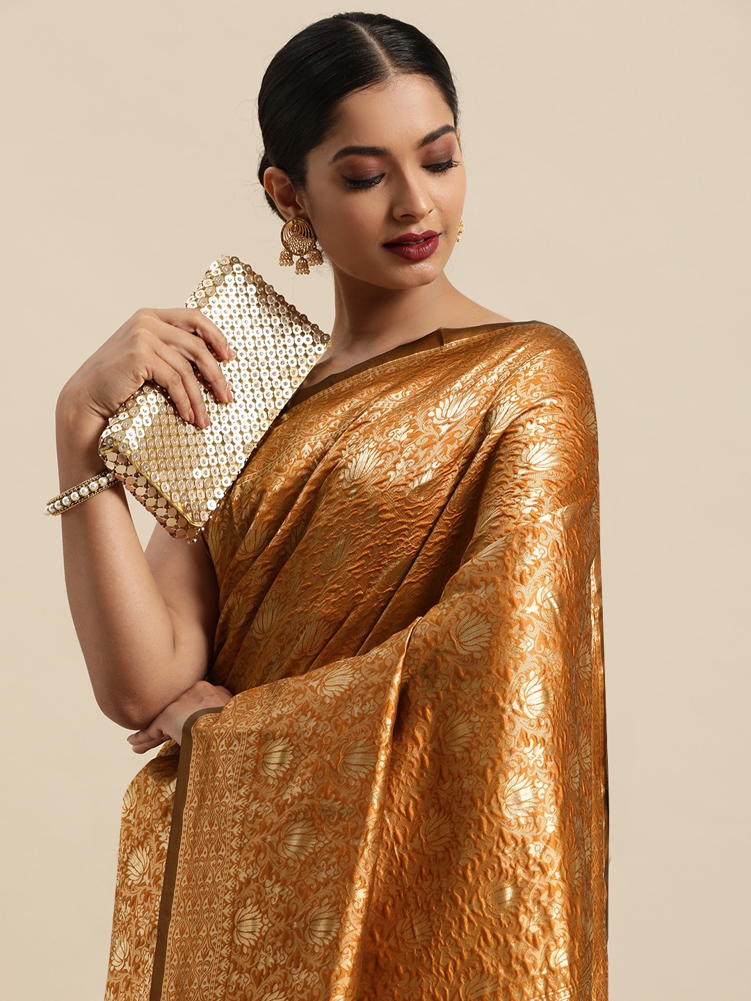 

Anouk Mustard & Gold-Toned Ethnic Motifs Zari Silk Blend Heavy Work Banarasi Saree