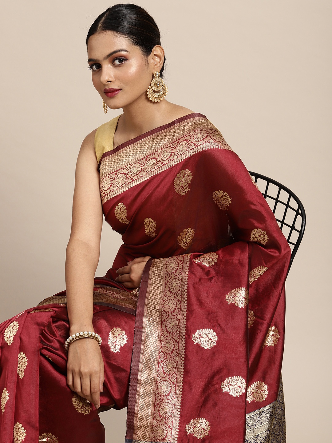 

Anouk Maroon & Gold-Toned Ethnic Motifs Zari Pure Silk Banarasi Saree