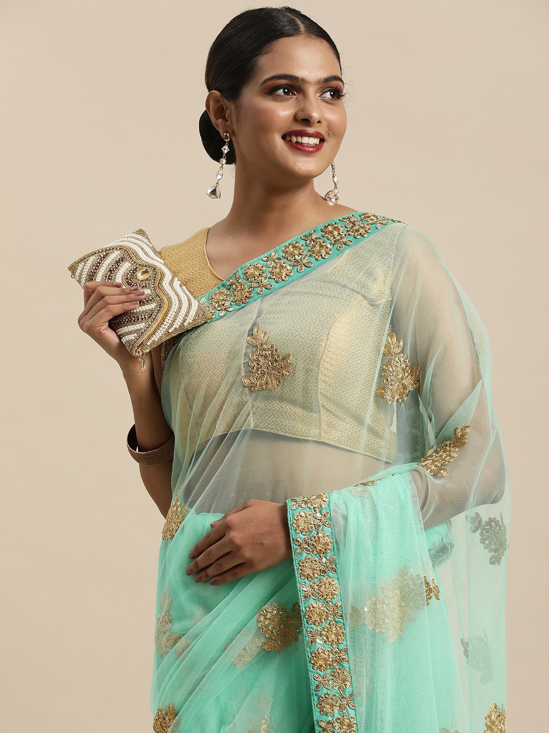 

Anouk Turquoise Blue Floral Sequinned Net Heavy Work Dabu Saree