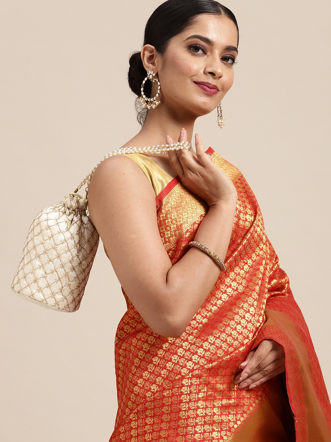 

Anouk Red & Gold-Toned Floral Zari Pure Silk Heavy Work Banarasi Saree