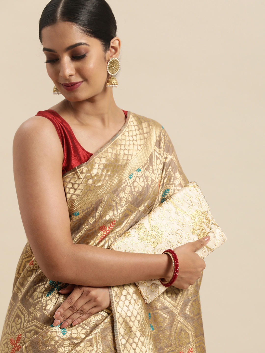 

Anouk Beige & Gold-Toned Woven Design Zari Pure Silk Heavy Work Banarasi Saree