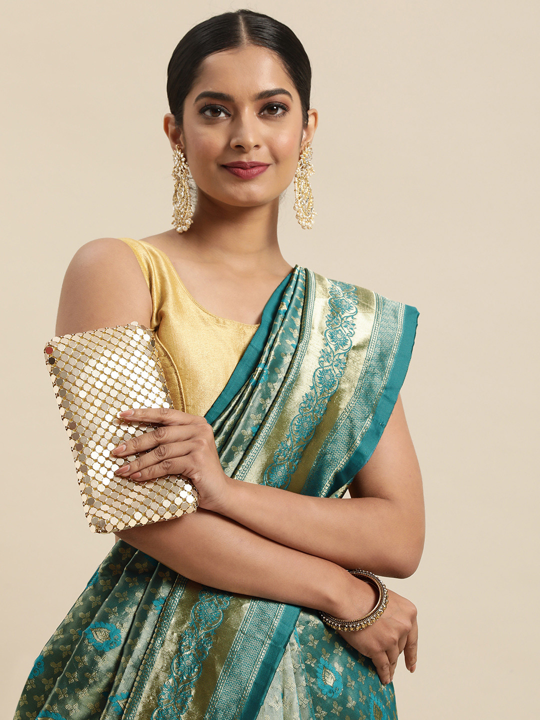 

Anouk Blue & Gold-Toned Ethnic Motifs Zari Silk Blend Banarasi Saree