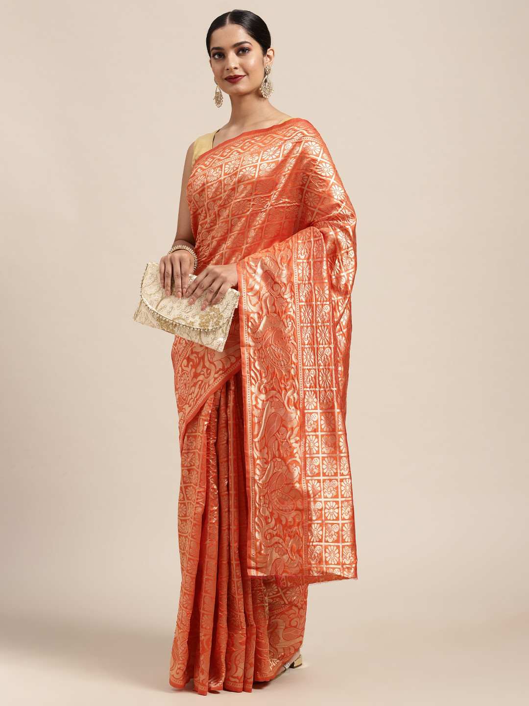 

Anouk Orange Ethnic Motifs Woven Zari Pure Silk Patola Saree