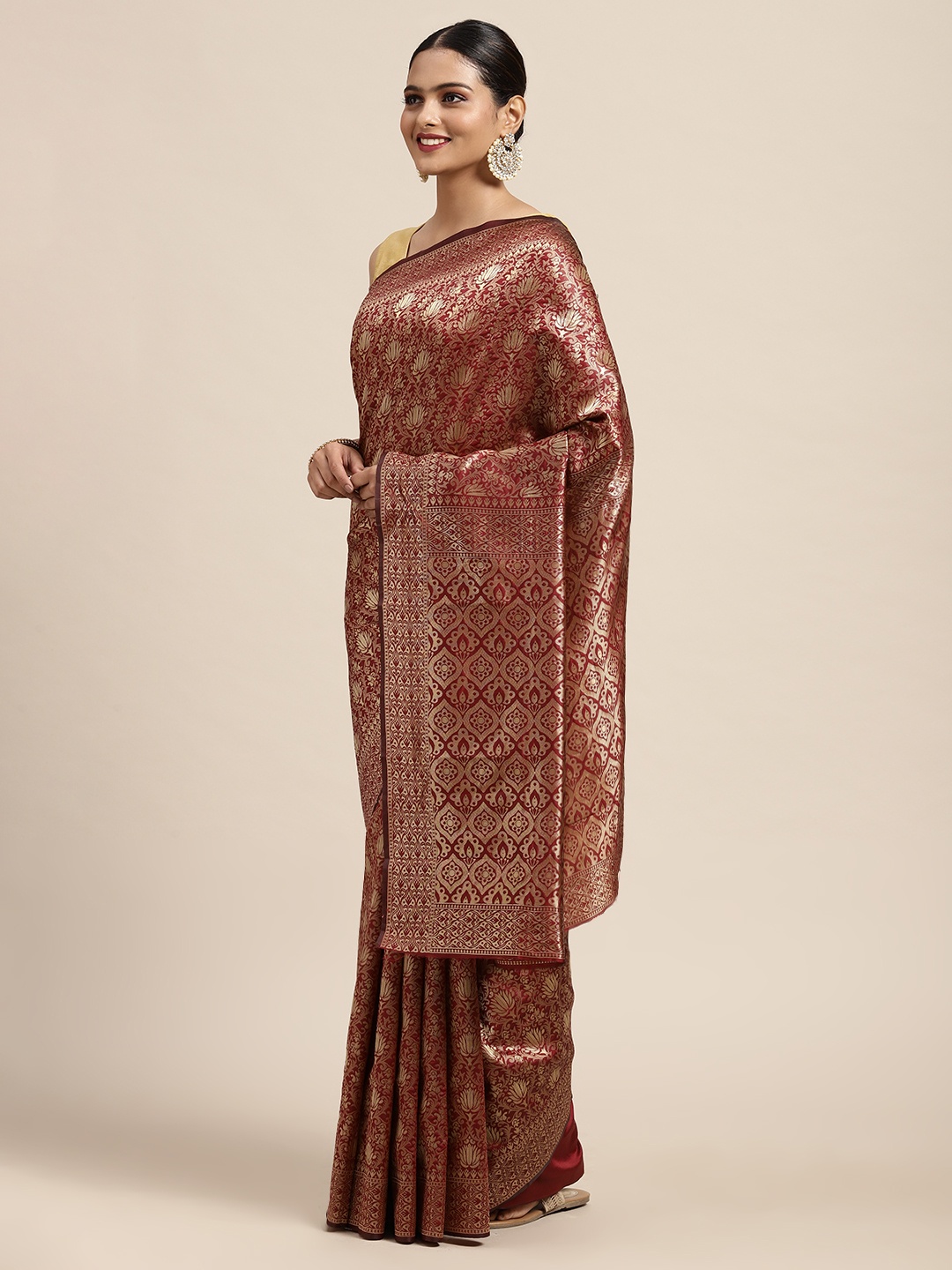 

Anouk Maroon & Gold-Toned Ethnic Motifs Zari Silk Blend Banarasi Saree