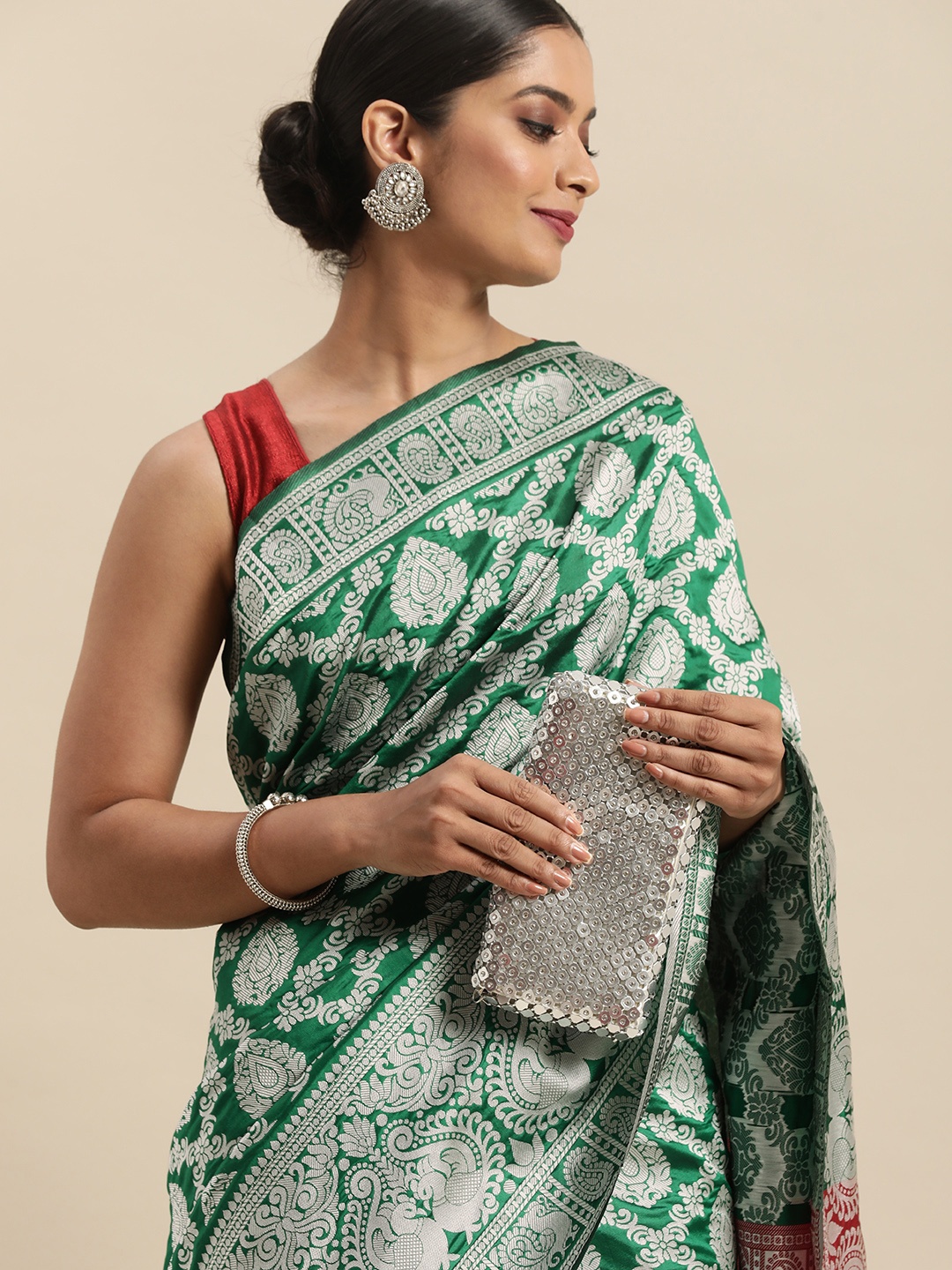 

Anouk Green & Silver-Toned Woven Design Zari Pure Silk Heavy Work Patola Saree