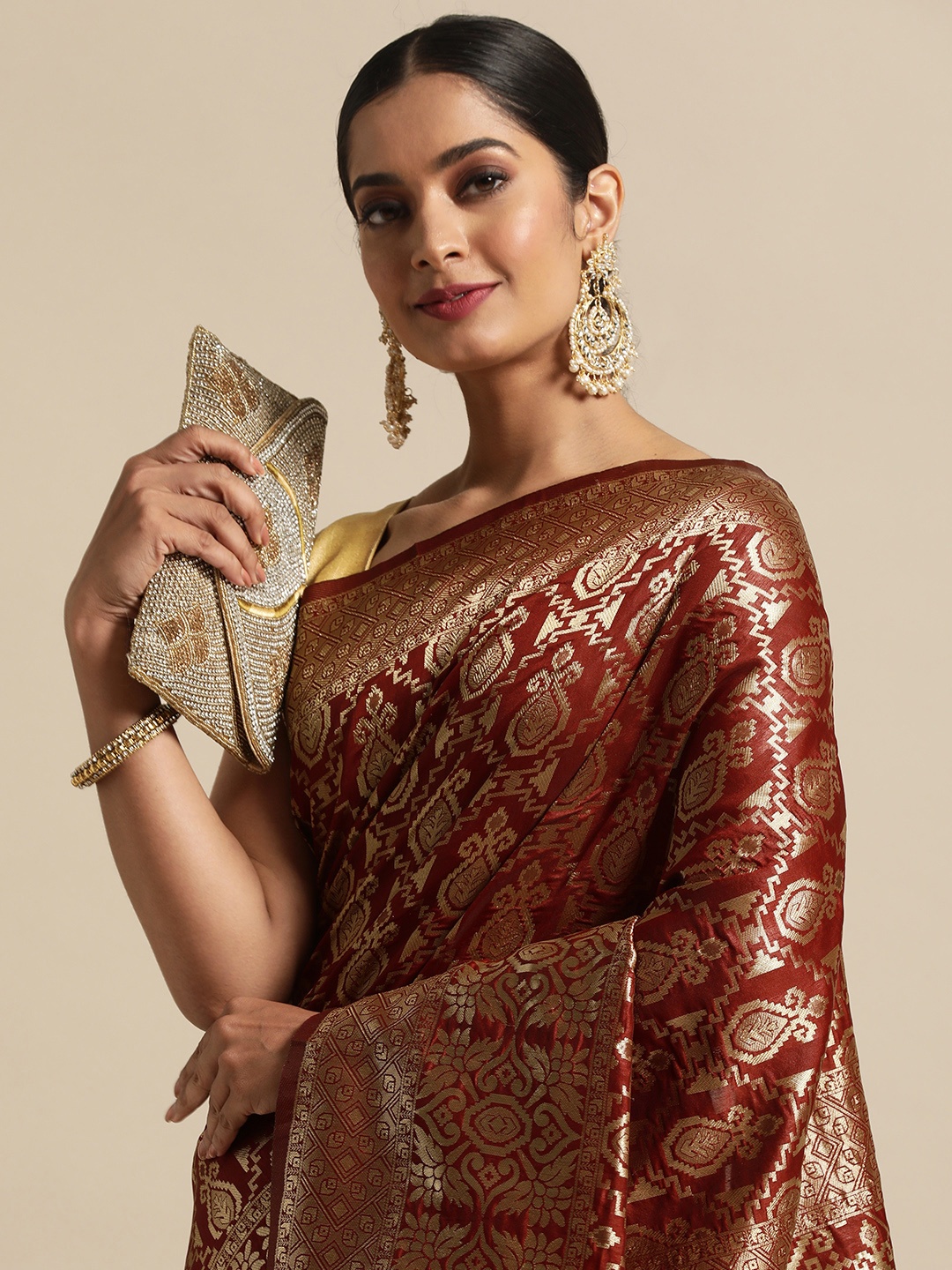 

Anouk Maroon & Gold-Toned Ethnic Motifs Zari Pure Silk Saree
