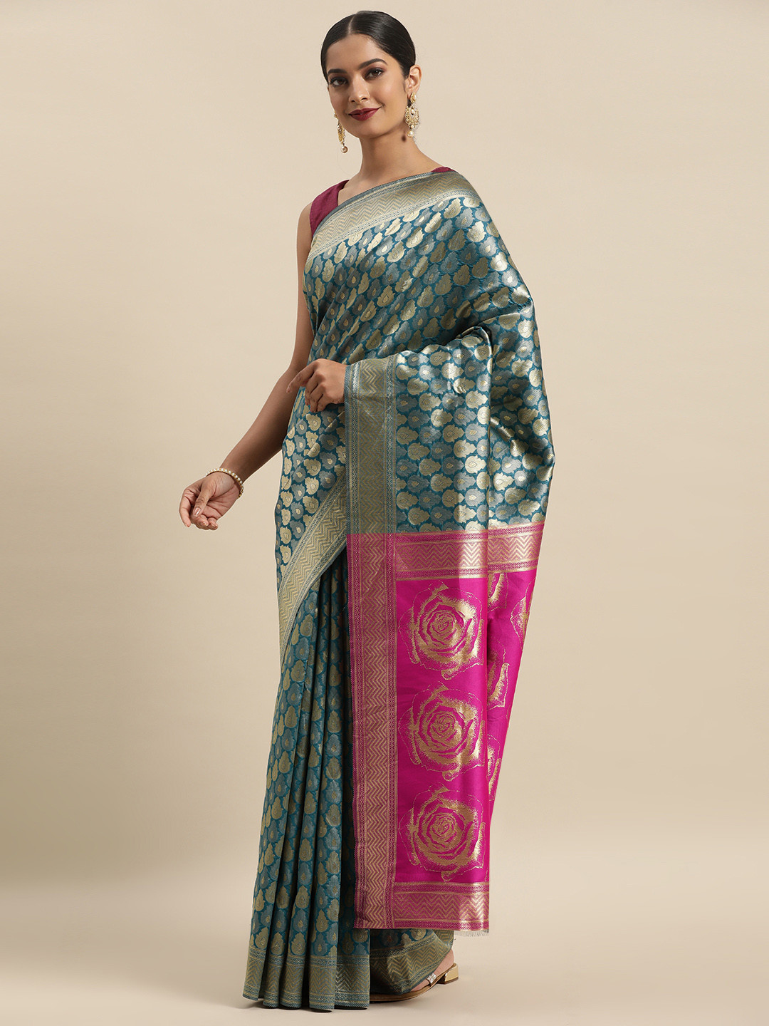 

Anouk Blue & Gold-Toned Ethnic Motifs Zari Silk Blend Banarasi Saree