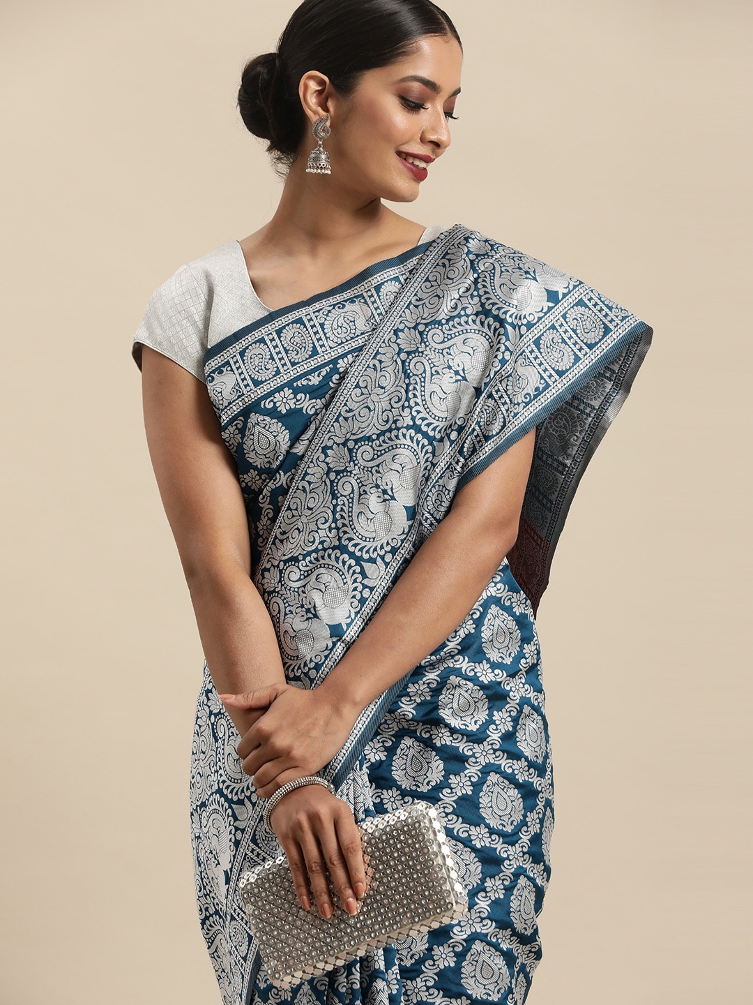 

Anouk Teal Blue & Silver-Toned Ethnic Motifs Zari Pure Silk Patola Saree