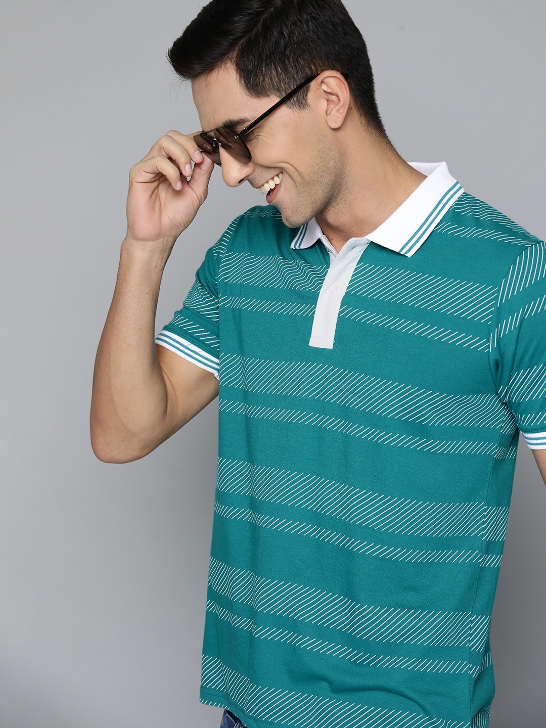 

HERE&NOW Men Teal & White Printed Polo Collar T-shirt
