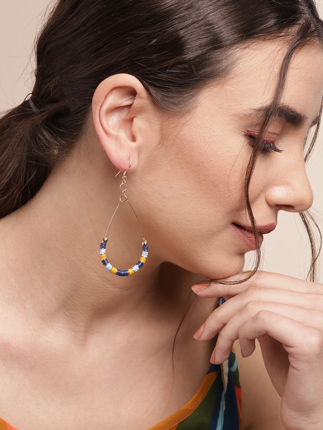 

Sangria Gold-Toned & Blue Sequin Teardrop Shaped Drop Earrings