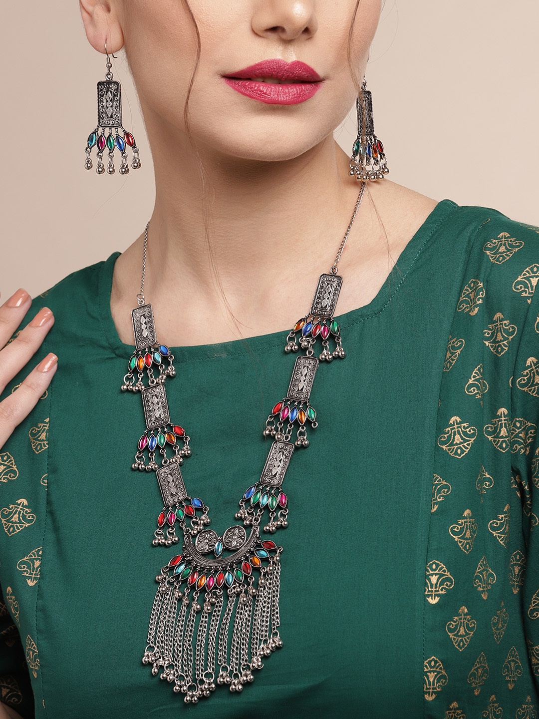 

Sangria Silver-Toned & Red Oxidised Stone Studded Tasselled Tribal Jewellery Set