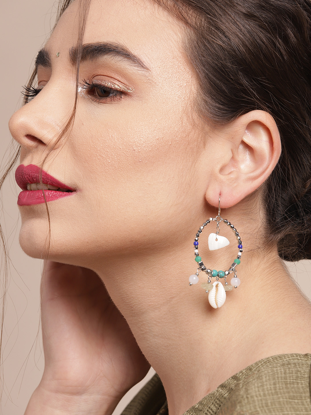 

Sangria Silver-Toned & Off White Cowrie Stone Studded & Beaded Circular Hoop Earrings