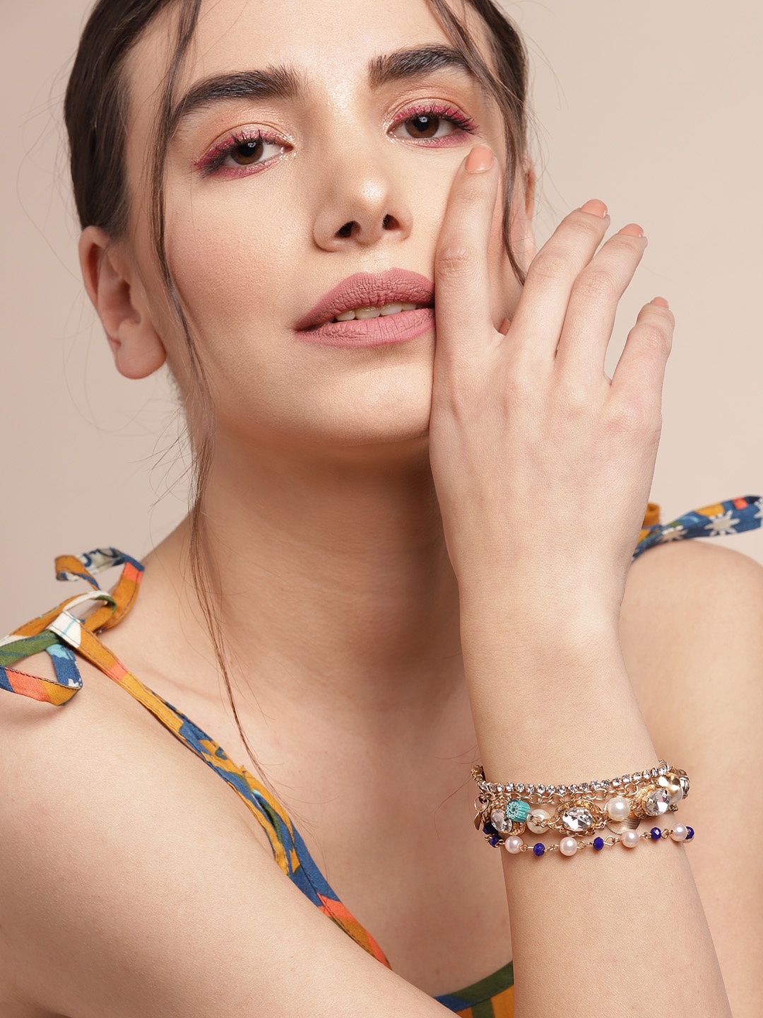

Sangria Women Gold-Toned & Blue Stone Studded & Beaded Cuff Bracelet