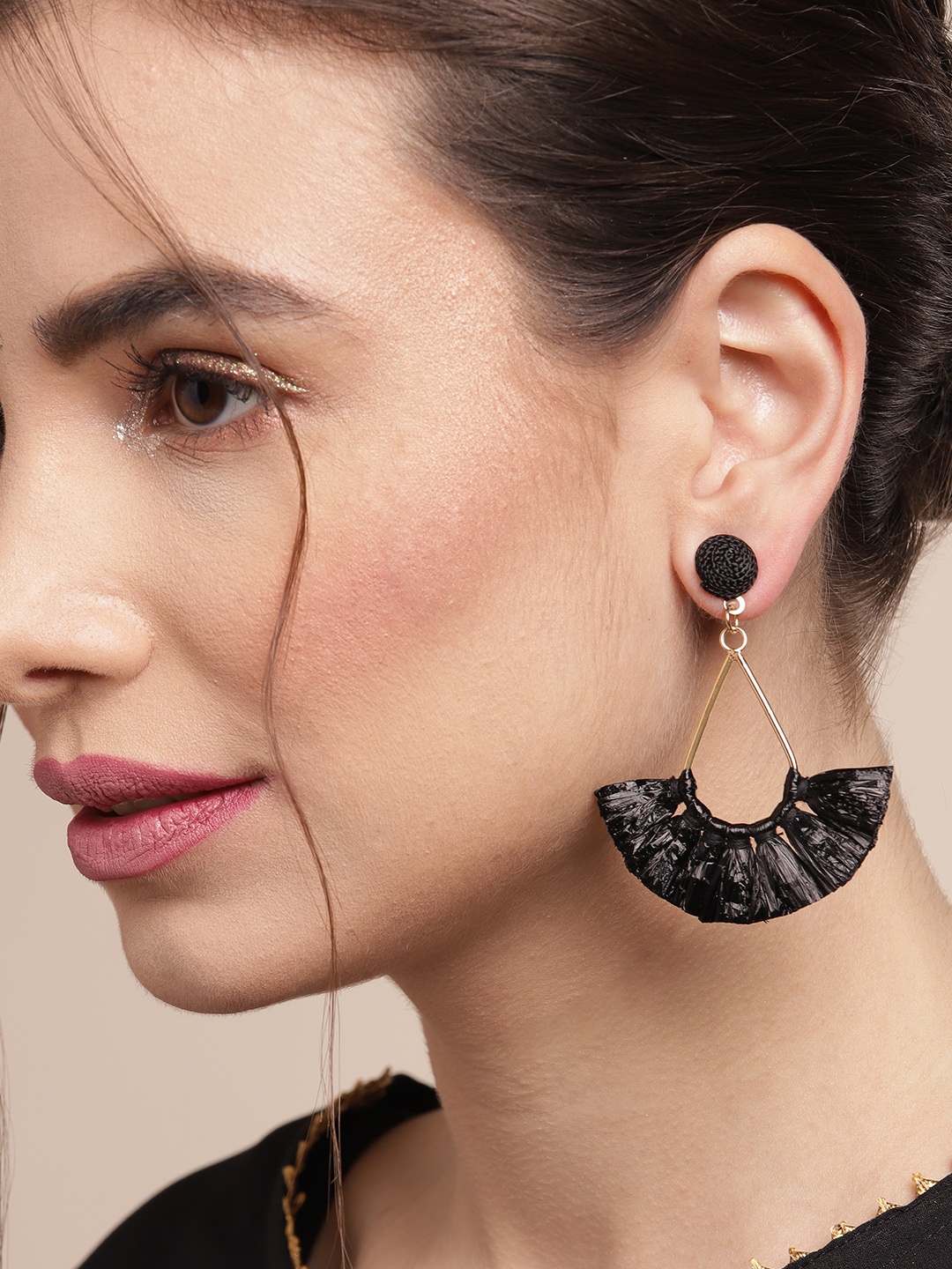 

Sangria Gold-Toned & Black Teardrop Shaped Tasseled Drop Earrings