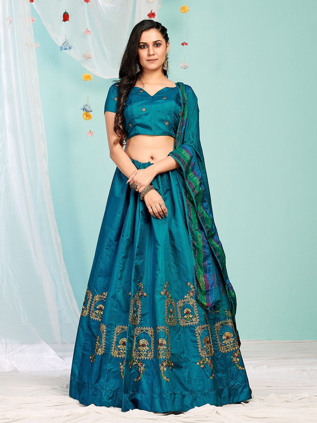 

SHOPGARB Women Teal & Gold Embroidered Semi-Stitched Lehenga Blouse With Dupatta
