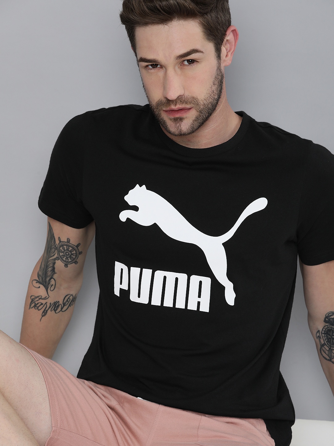 

Puma Men Black & White Brand Logo Printed T-shirt