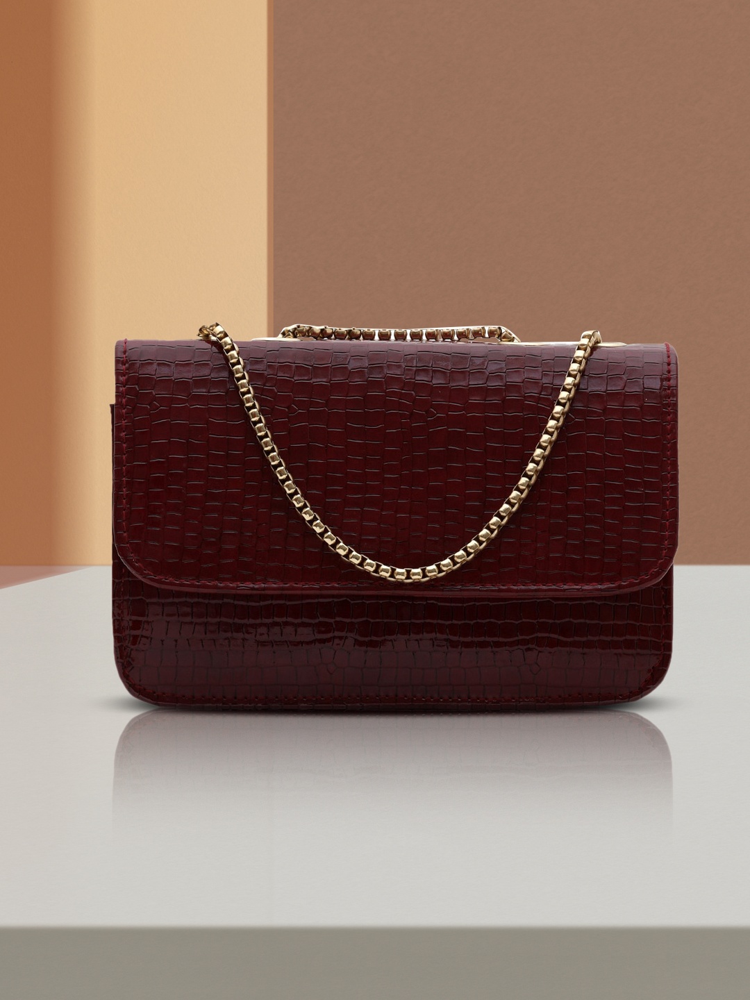 

gaura pakhi Maroon Textured Swagger Sling Bag