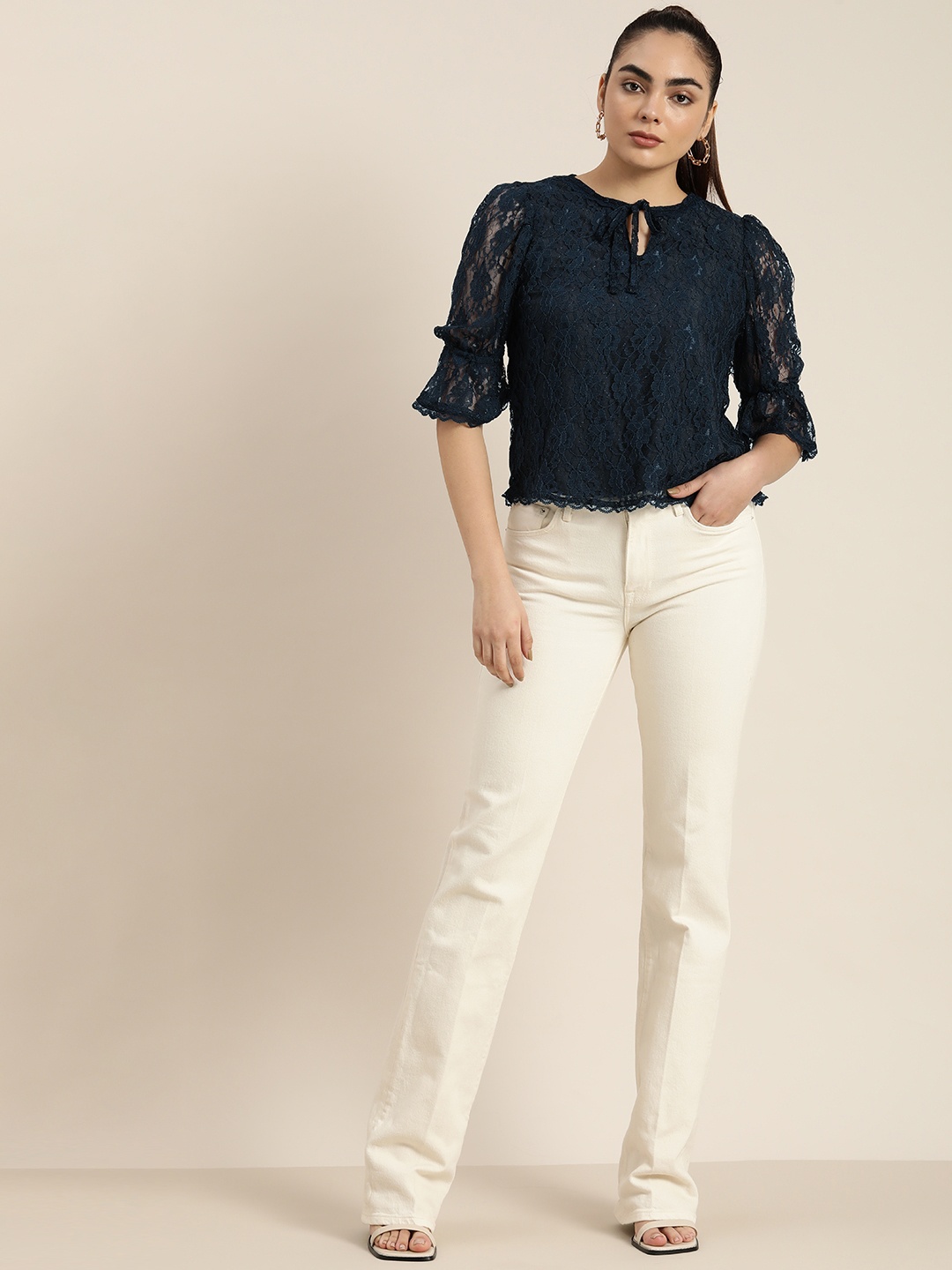 

Moda Rapido Navy Blue Floral Tie-Up Neck Lace Top