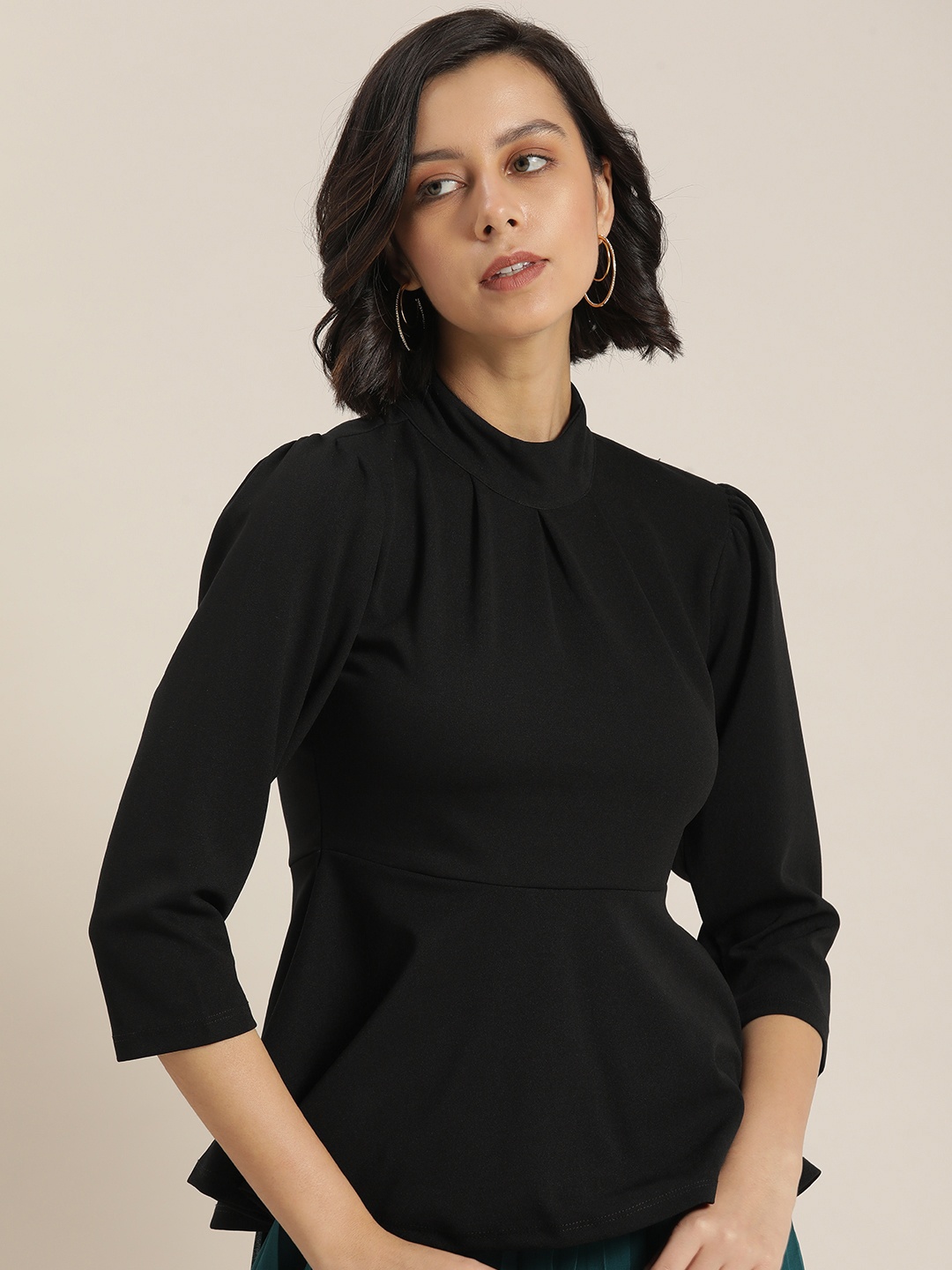 

Moda Rapido Black Peplum Top