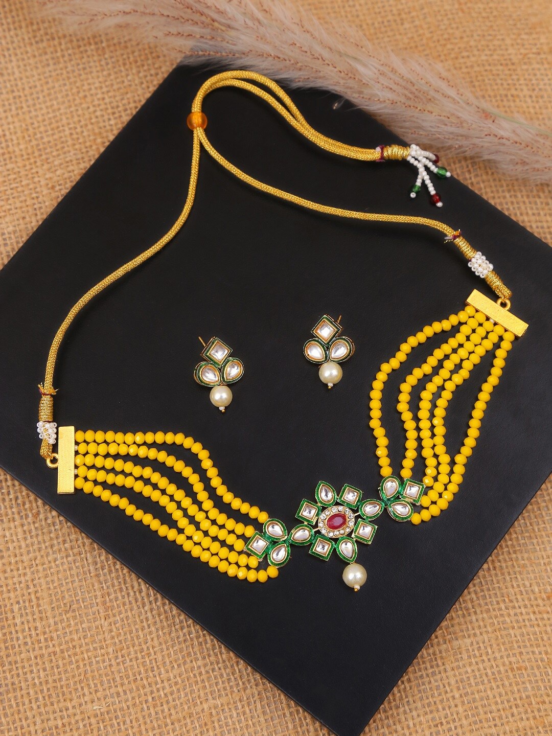 

Crunchy Fashion Woman Gold & Yellow Jewellery Set