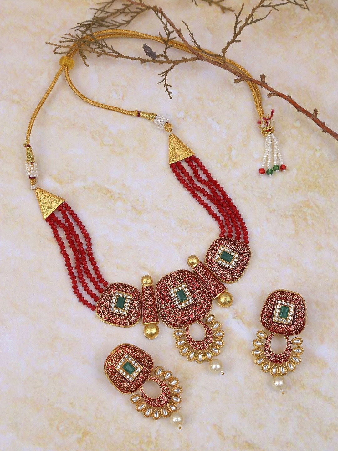 

Crunchy Fashion Enamelled Gold-Plated Red & White Kundan Studded & Pearls Beaded Jewellery Set