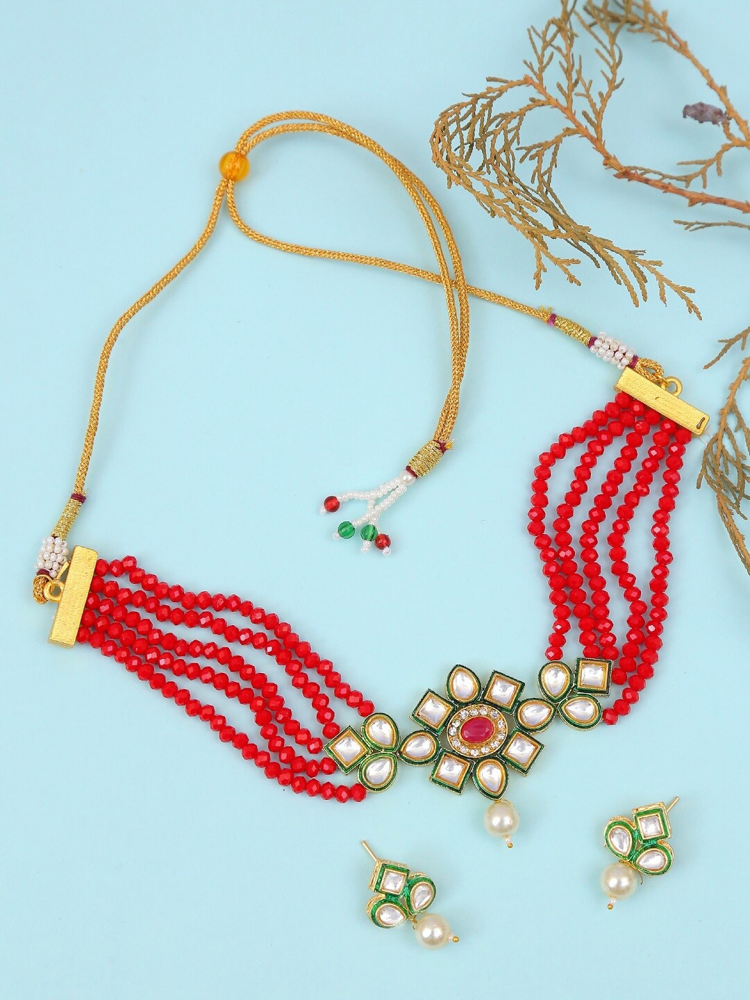 

Crunchy Fashion Enamelled Gold-Plated Red & White Kundan Studded & Pearls Beaded Jewellery Set
