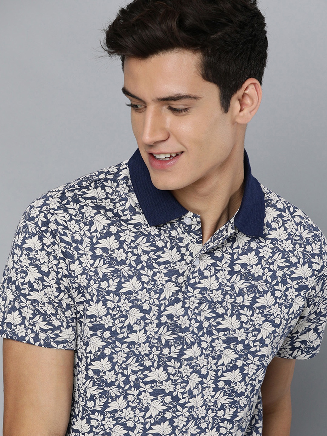 

Mast & Harbour Men Navy Blue & Off White Floral Printed Polo Collar T-shirt