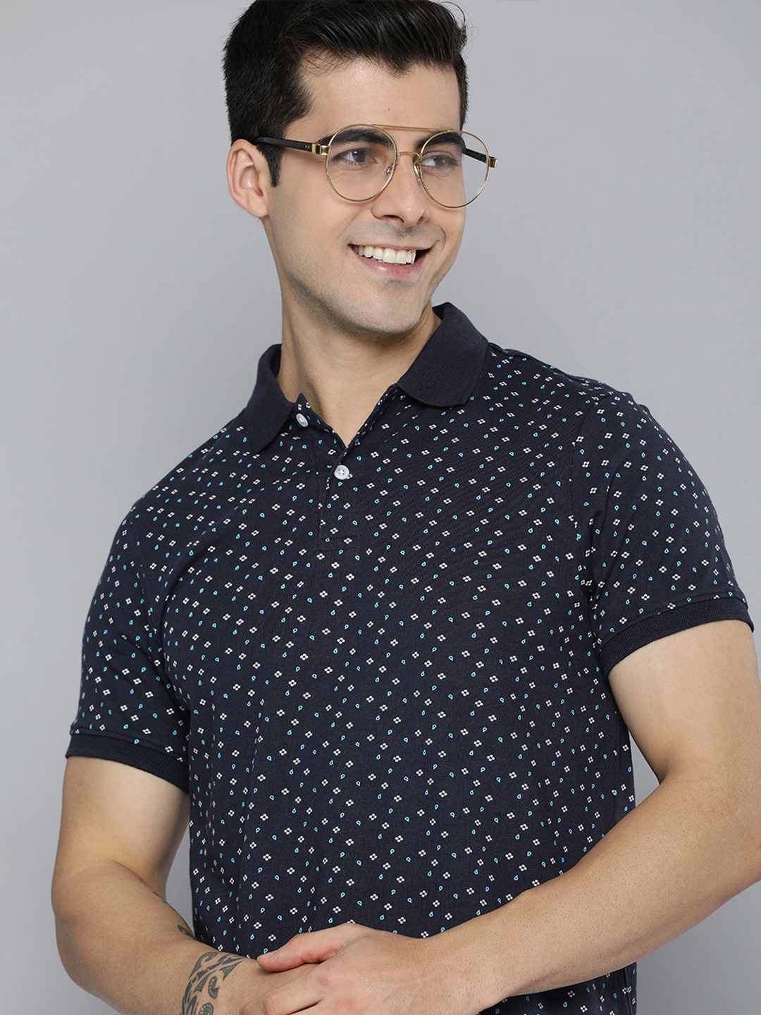 

Mast & Harbour Men Navy Blue Geometric Printed Polo Collar Casual T-shirt