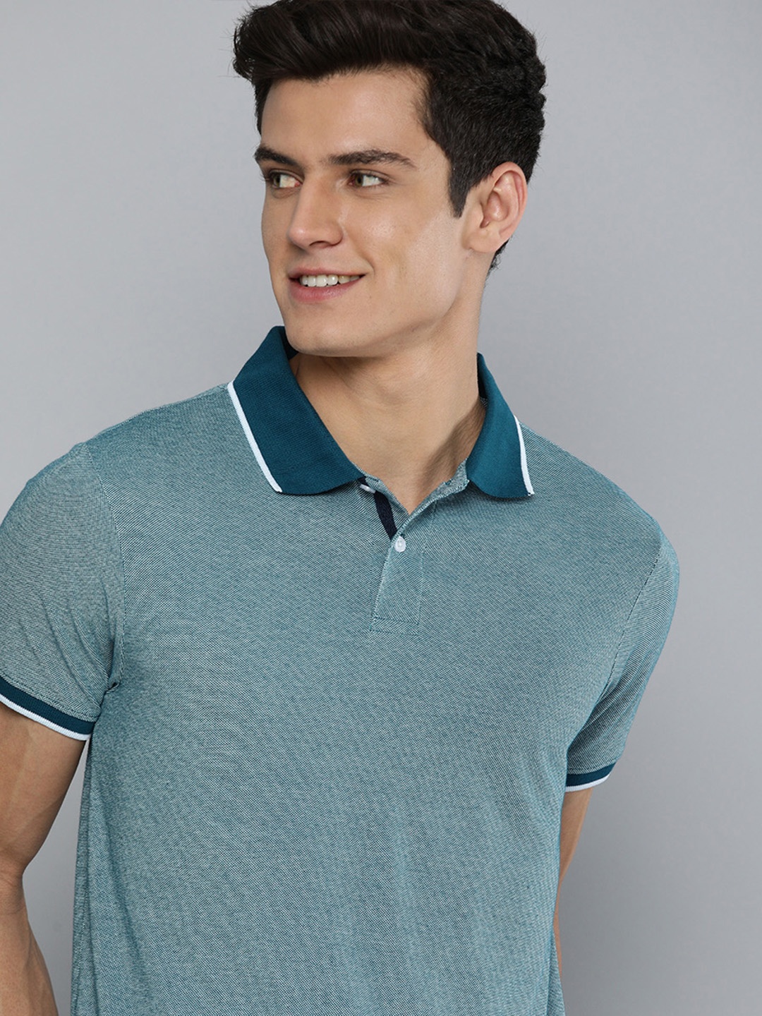 

Mast & Harbour Men Blue Self- Design Polo Collar T-shirt