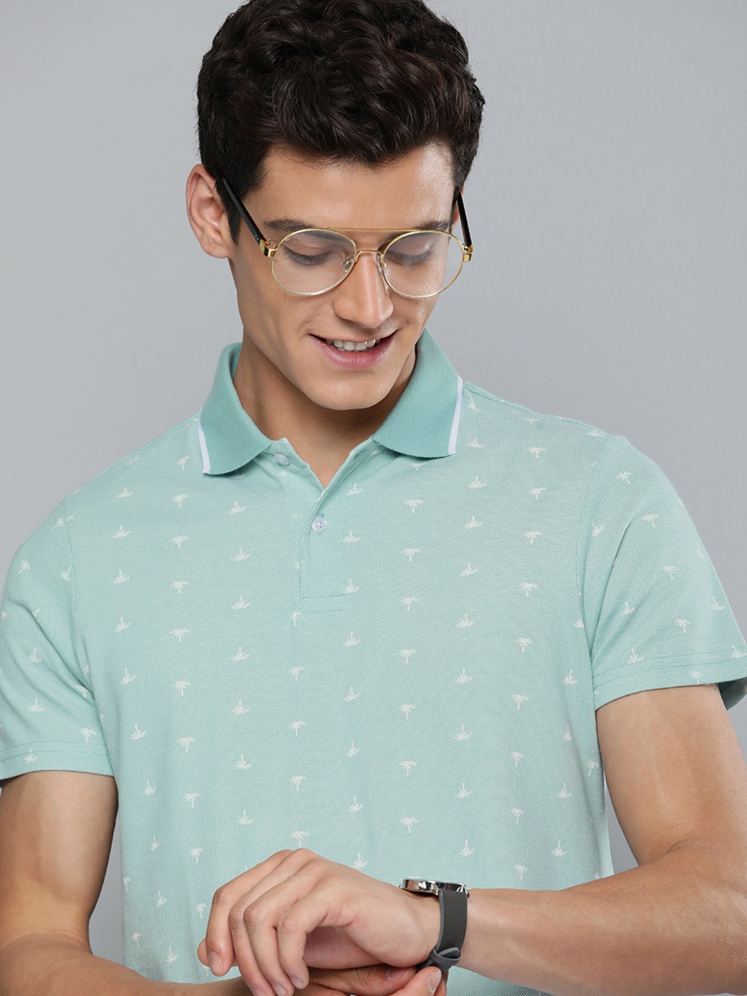 

Mast & Harbour Men Aqua Green & White Printed Polo Collar T-shirt, Sea green
